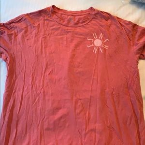 red t-shirt with “sunshine” on the left side!